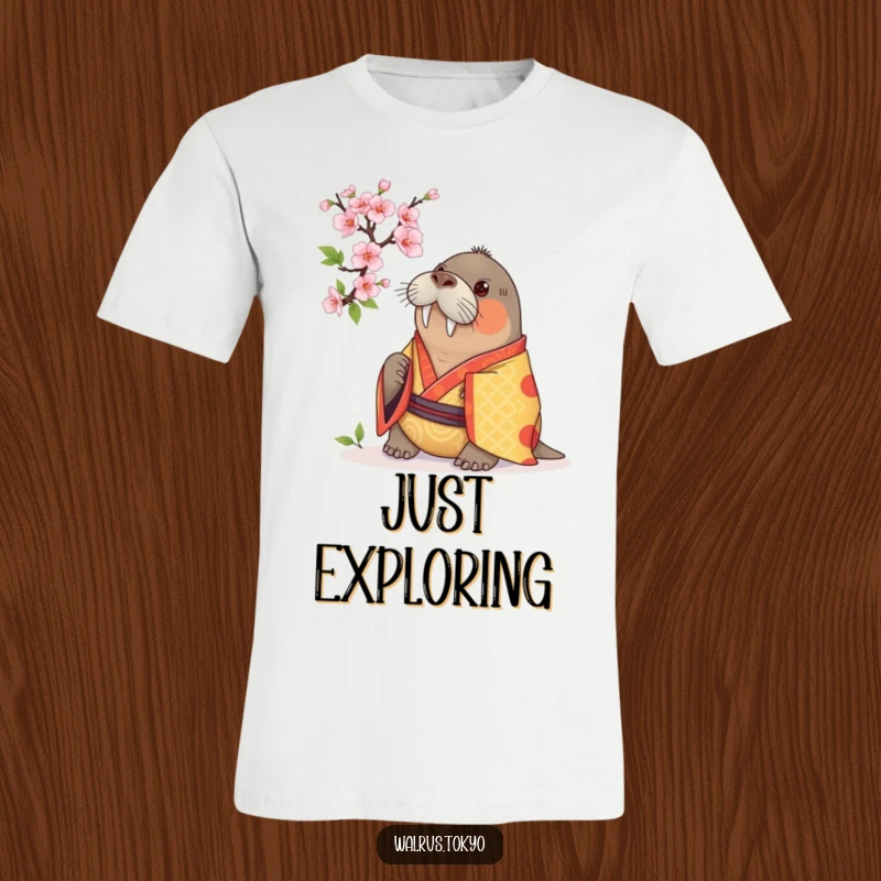 Funny T-shirt depicting a curious walrus in a vibrant kimono, examining a cherry blossom, highlighting a sense of wonder and humor.